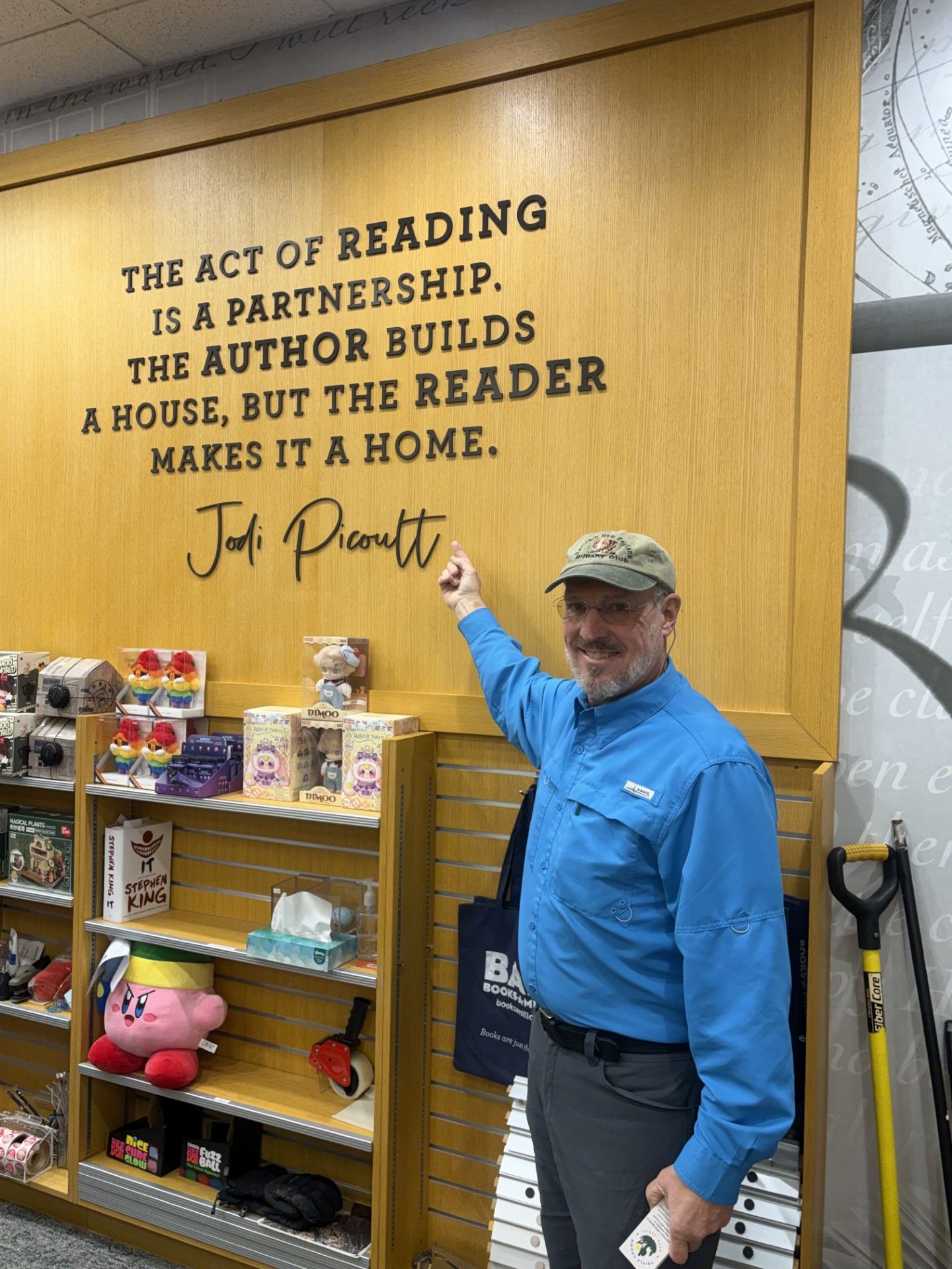 Man points at a quote: 