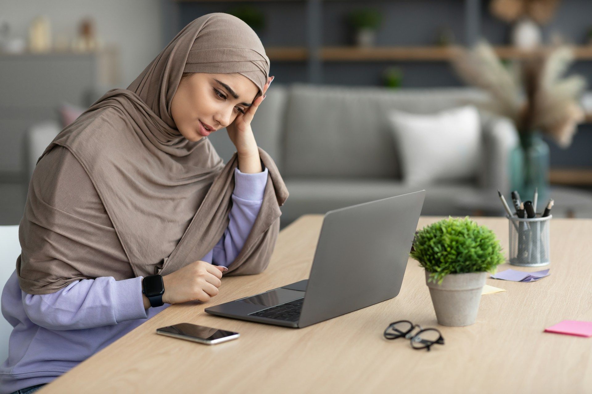 woman working with a headache