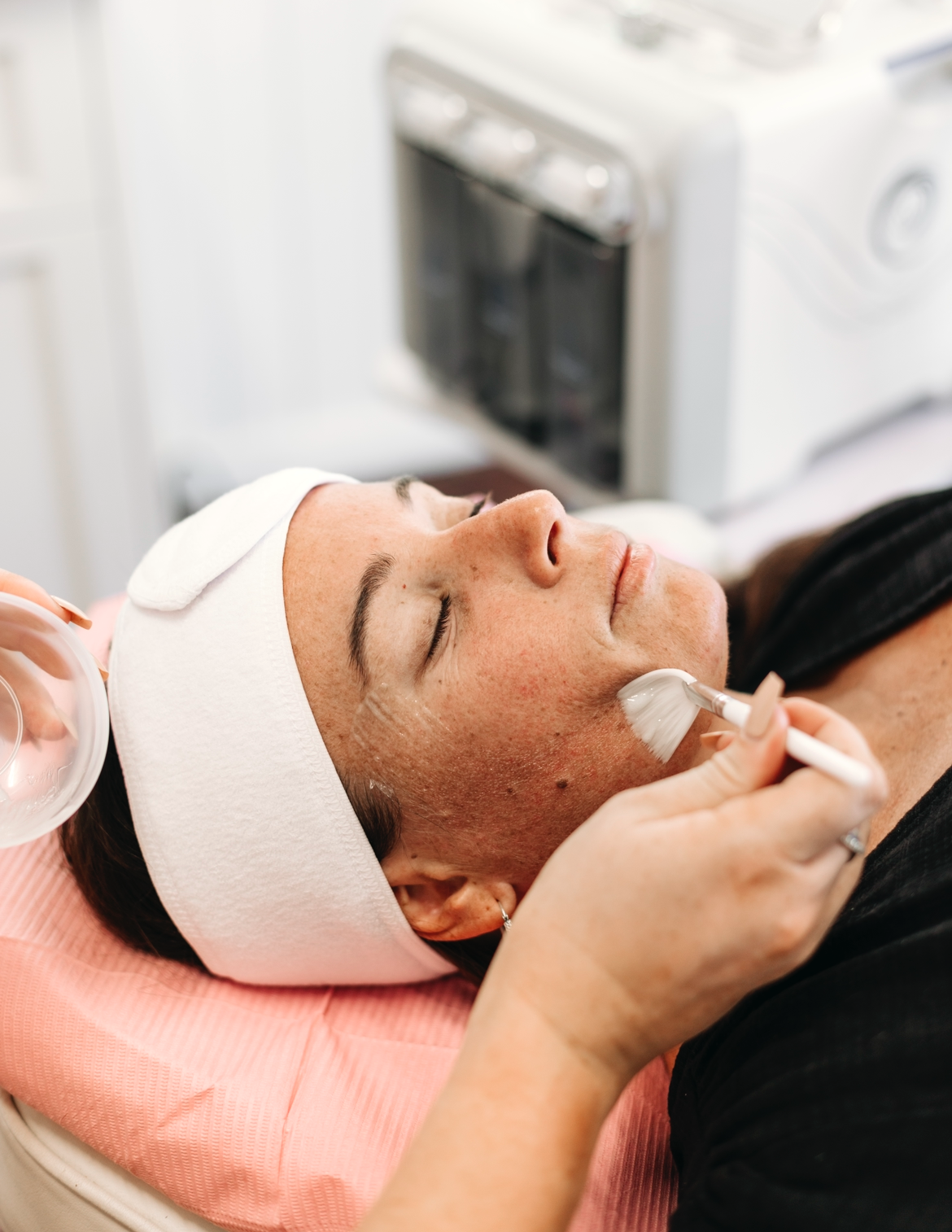 Woman With a Bandage on Her Head is Getting a Facial Treatment — Gladstone Beauty Clinic In Gladstone Central, QLD