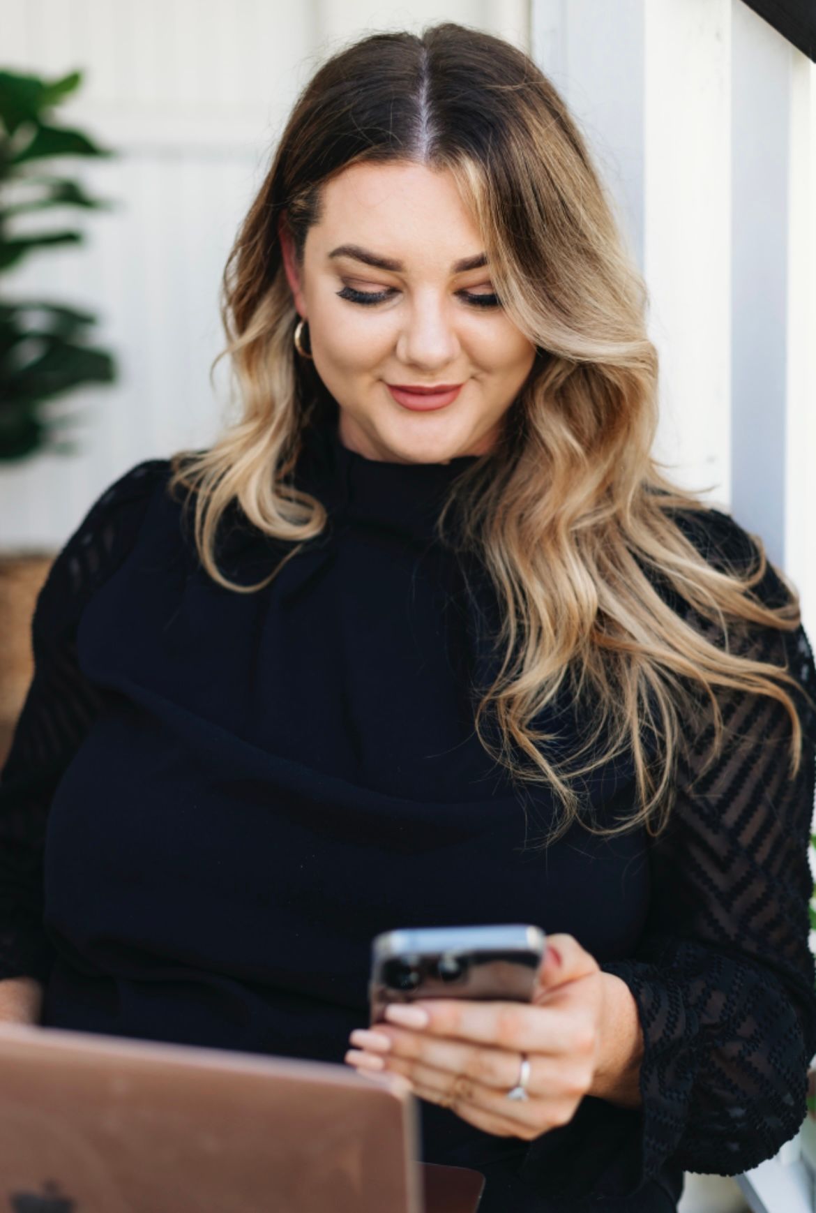 Smiling Hairdresser Woman Standing On The Salon Shop — Gladstone Beauty Clinic In Gladstone Central QLD
