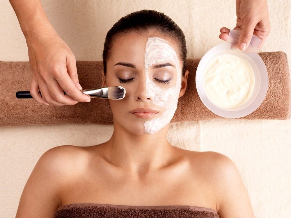 Woman is Getting a Facial Treatment at a Spa — Gladstone Beauty Clinic In Gladstone Central ,QLD.