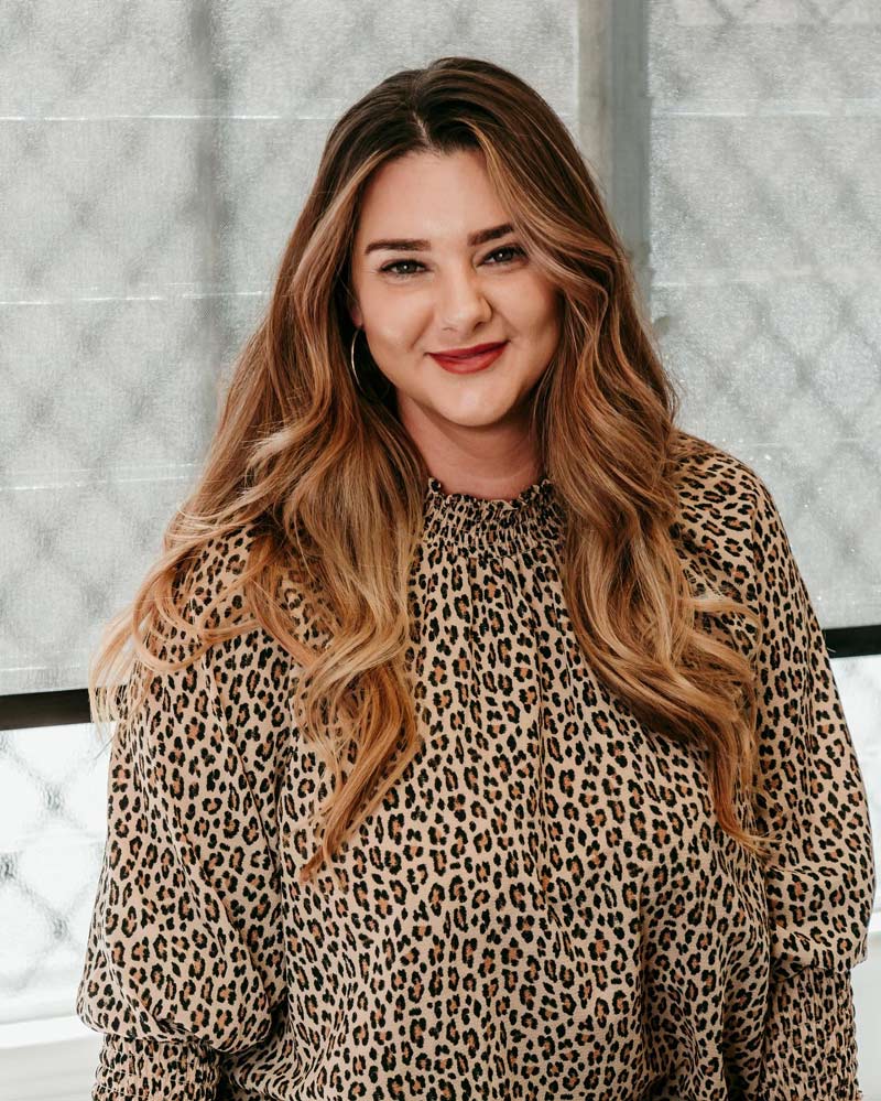 Woman With Blonde Curly Hair — Gladstone Beauty Clinic In Gladstone Central QLD