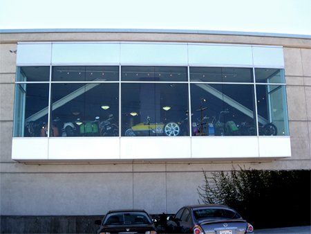 Plesanton — Glass Window of Car Shop in Plesanton, CA