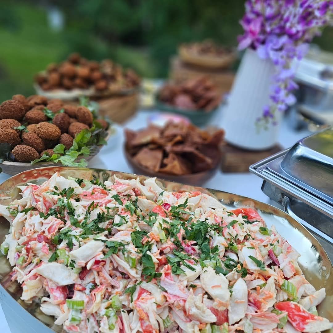 Buffet table with crab salad, falafel, and other appetizers. — The Habibiz Catering In Wingham, NSW