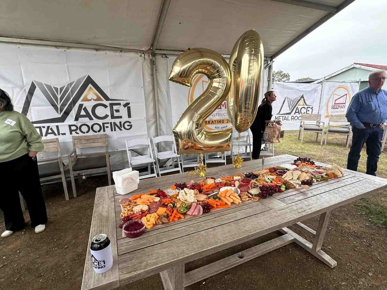 A Long Table with A Charcuterie Board and Gold Balloons — The Habibiz Catering in Port Macquarie, NSW 