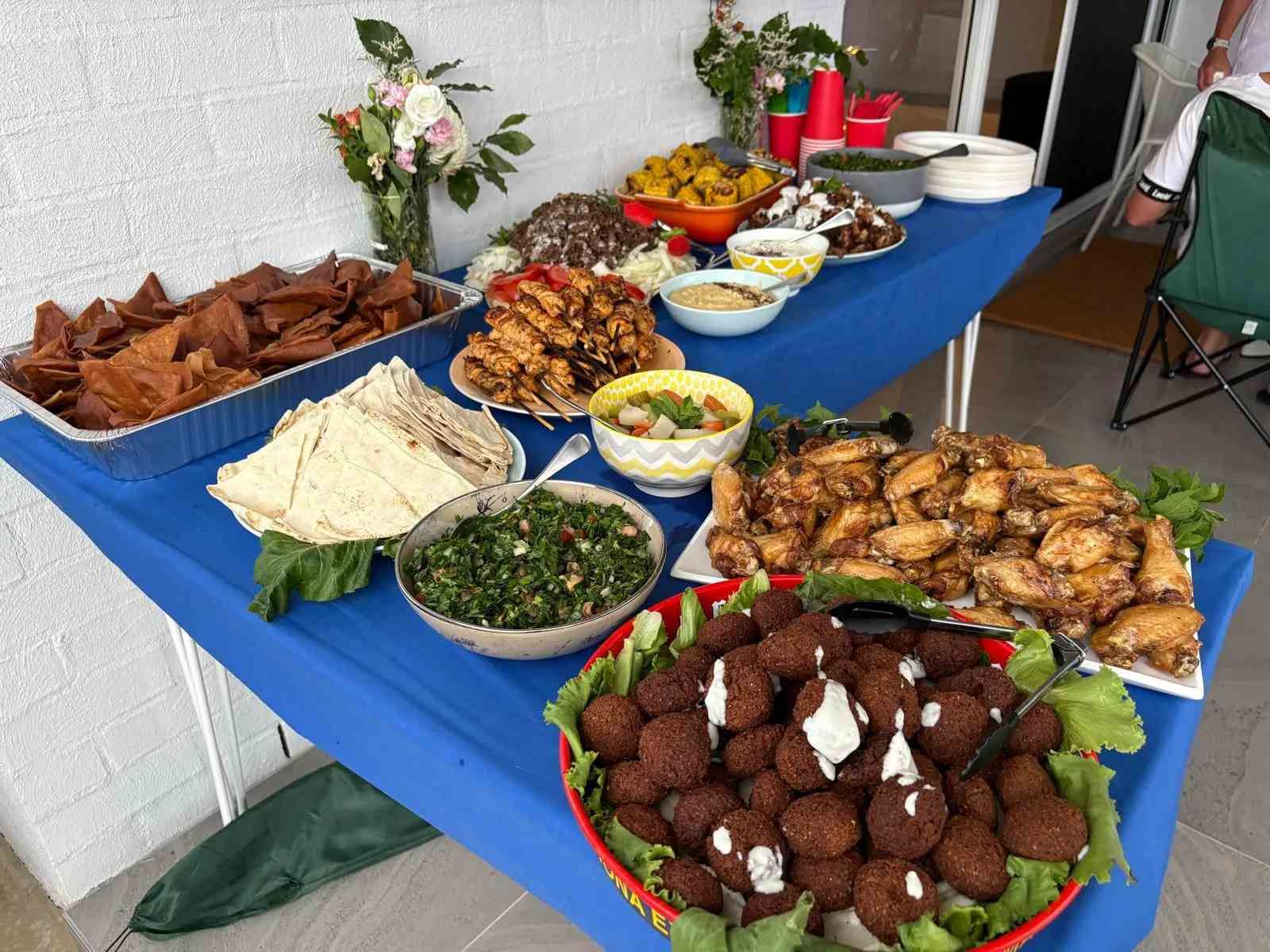Outdoor Party Food Spread on Blue Tables — The Habibiz Catering in Forster, NSW