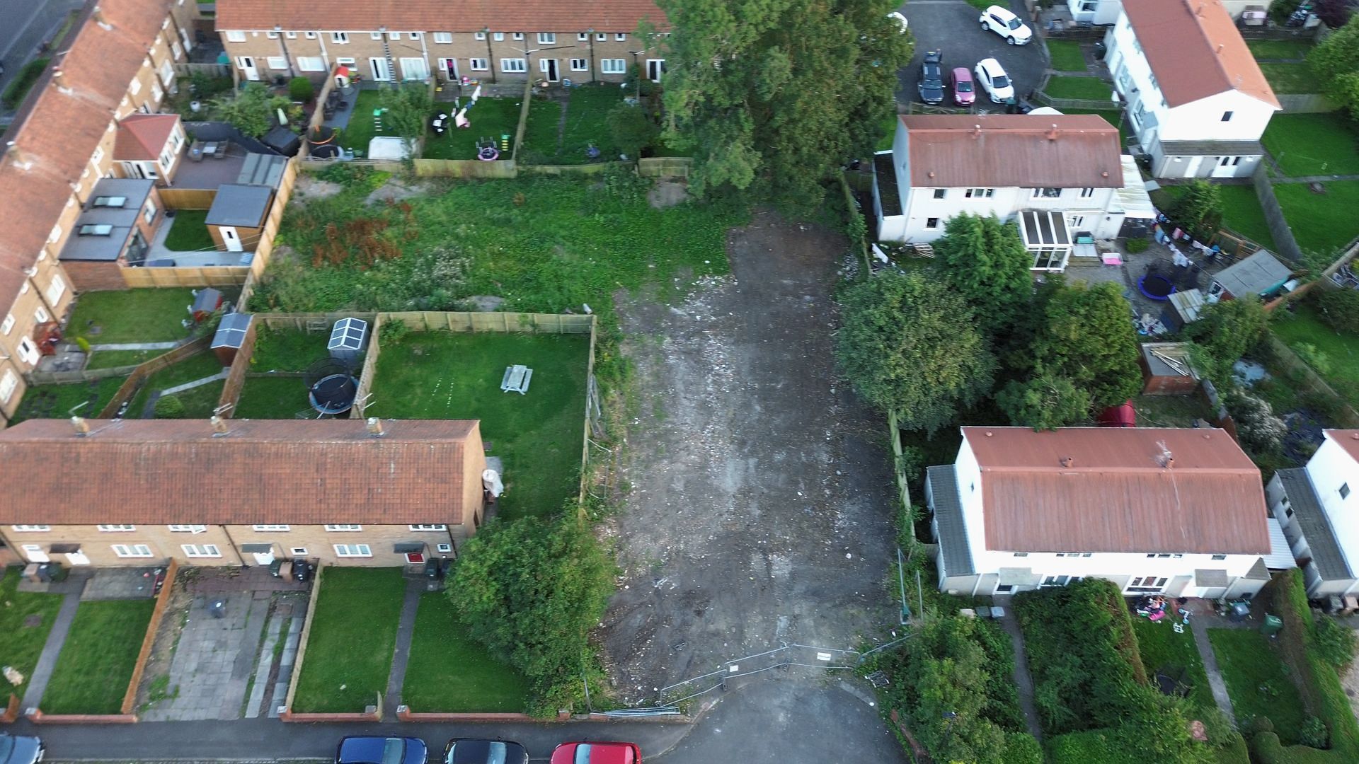 A front view of the site upon completion of the demolition, grading and tracking in of the land.