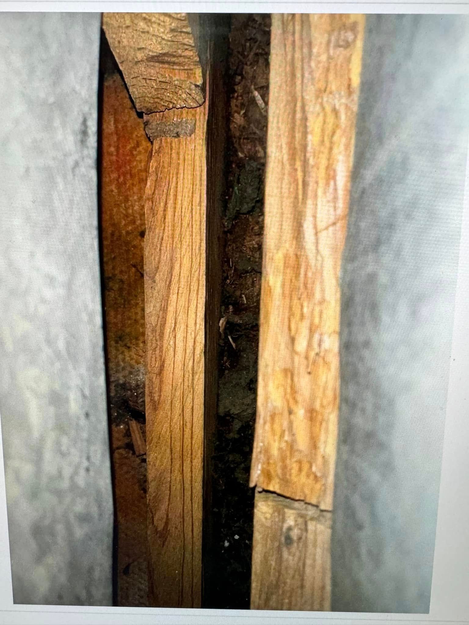 A close up of a piece of wood on a wall