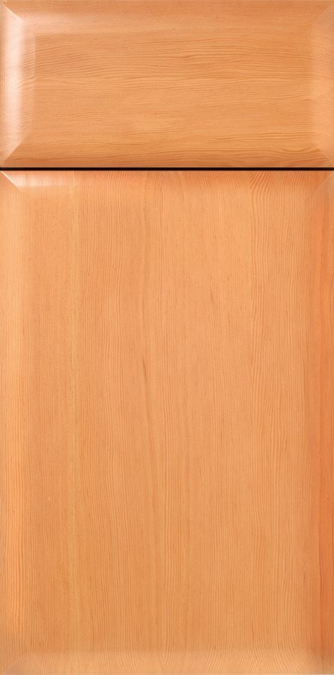 A wooden cabinet door with a raised panel and a light-orange stain.