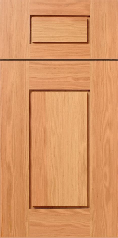 Close-up of a wooden cabinet door with a recessed panel design.