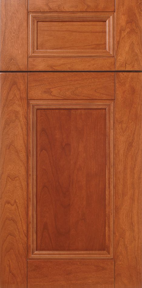 Wooden cabinet door with raised panel and recessed upper detail.