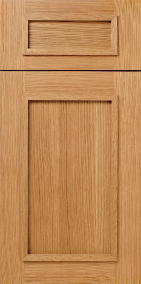 Wooden cabinet door with a rectangular inset panel and small upper inset.