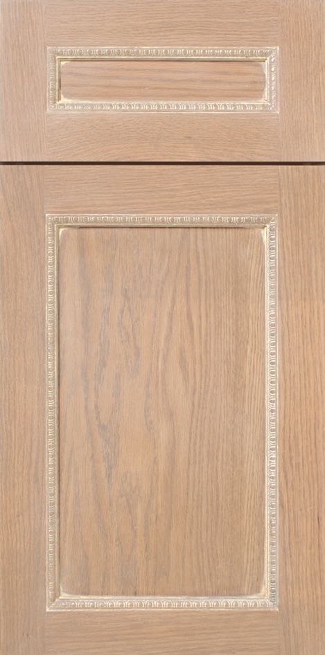 Wooden cabinet doors with decorative trim.