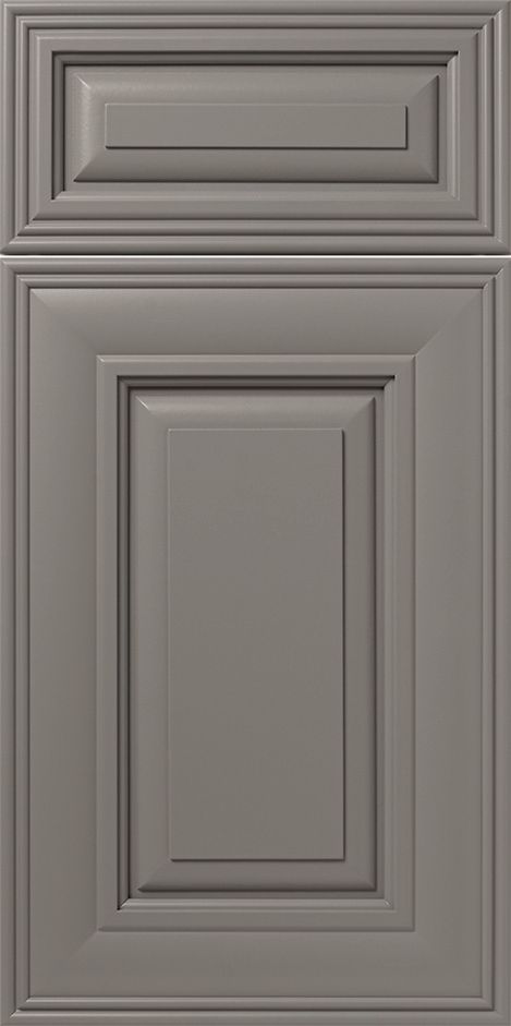 Gray cabinet door with raised panel and decorative molding.