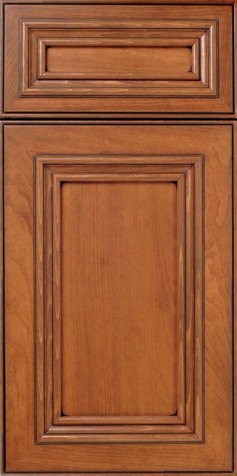 Wooden kitchen cabinet door with a layered, framed design.