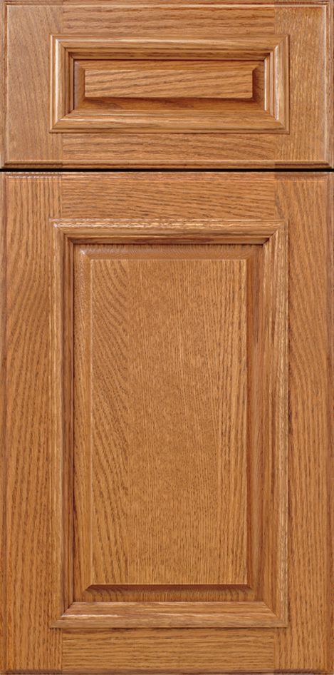 Wooden kitchen cabinet door with recessed panels, medium brown with visible wood grain.
