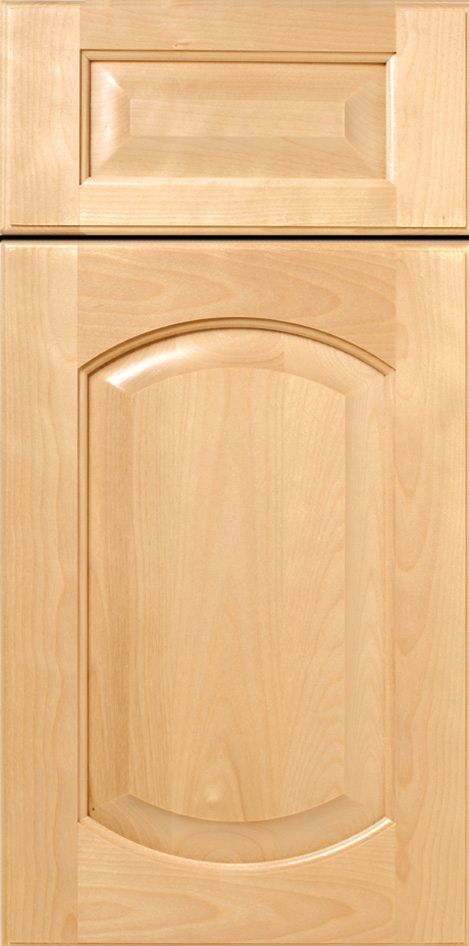 Wooden cabinet door with raised center panel and decorative arch.