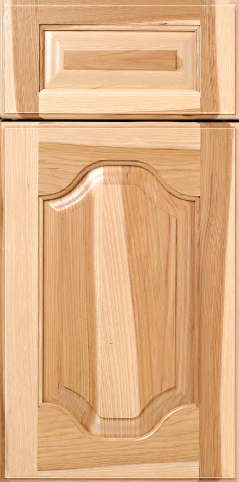 Wooden cabinet door with decorative panel and raised upper section.