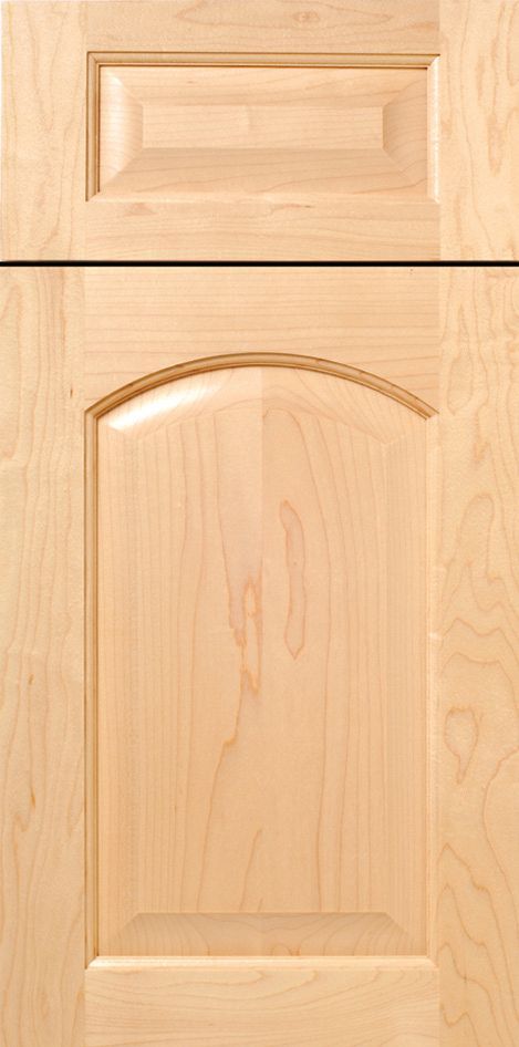 Light wood kitchen cabinet door with arched center panel.