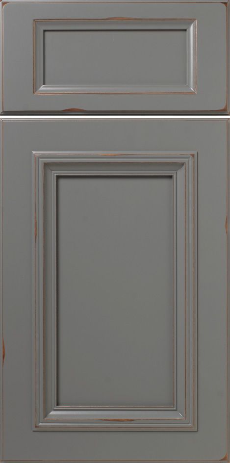 Gray kitchen cabinet doors with distressed edges.