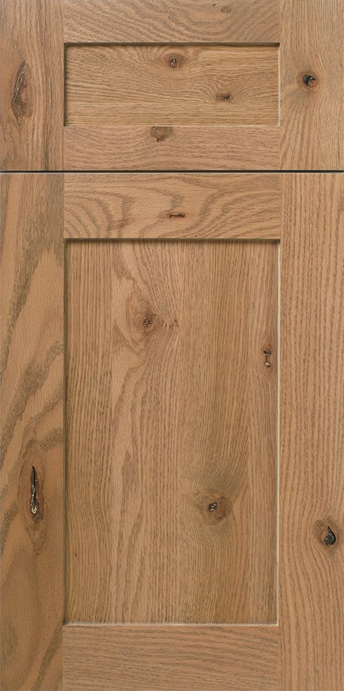 Wooden cabinet door with a rectangular inset, medium brown finish.