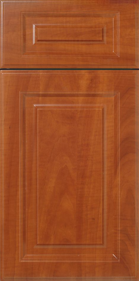 Wooden cabinet door with recessed paneling in a medium brown color.