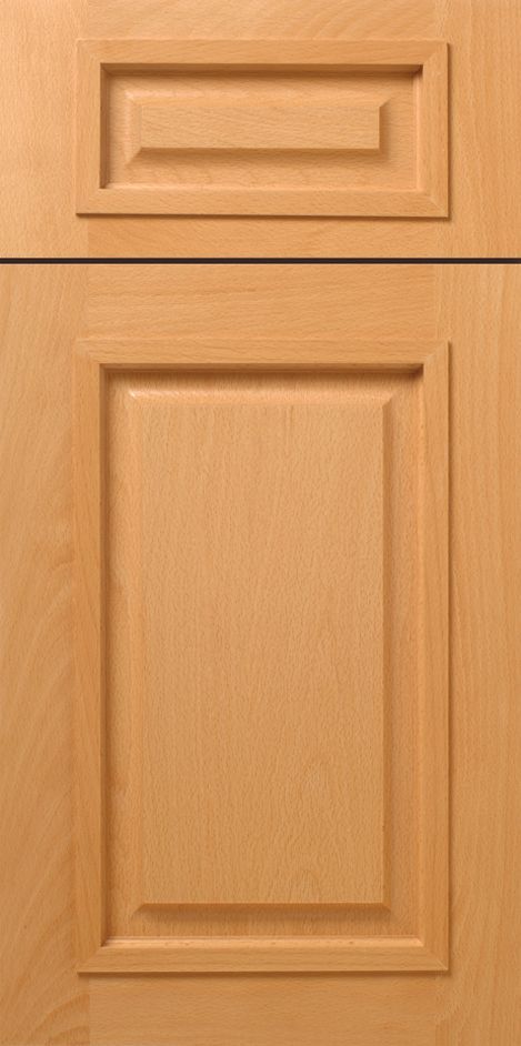 Wooden cabinet door with recessed panel and decorative upper section.