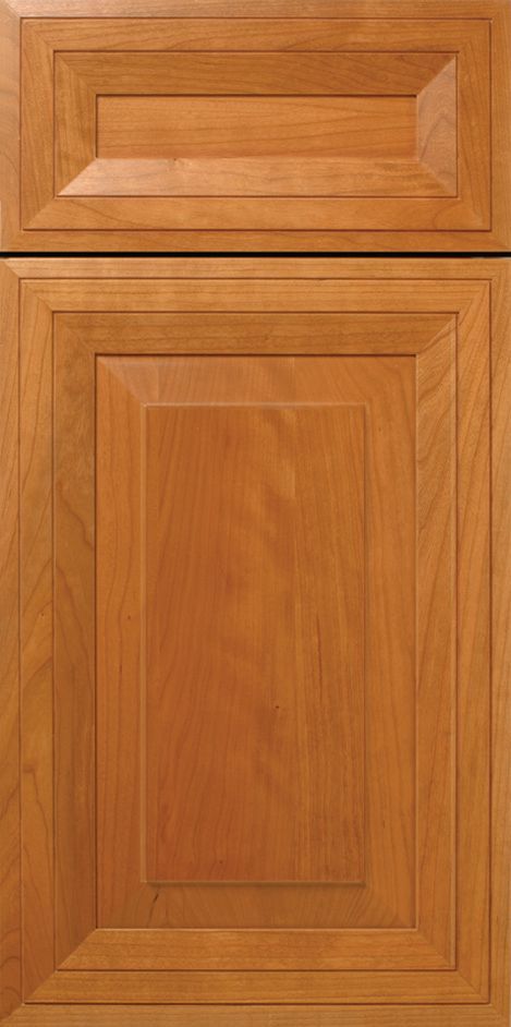 Close-up of two wooden cabinet doors. The doors are stained a medium brown.
