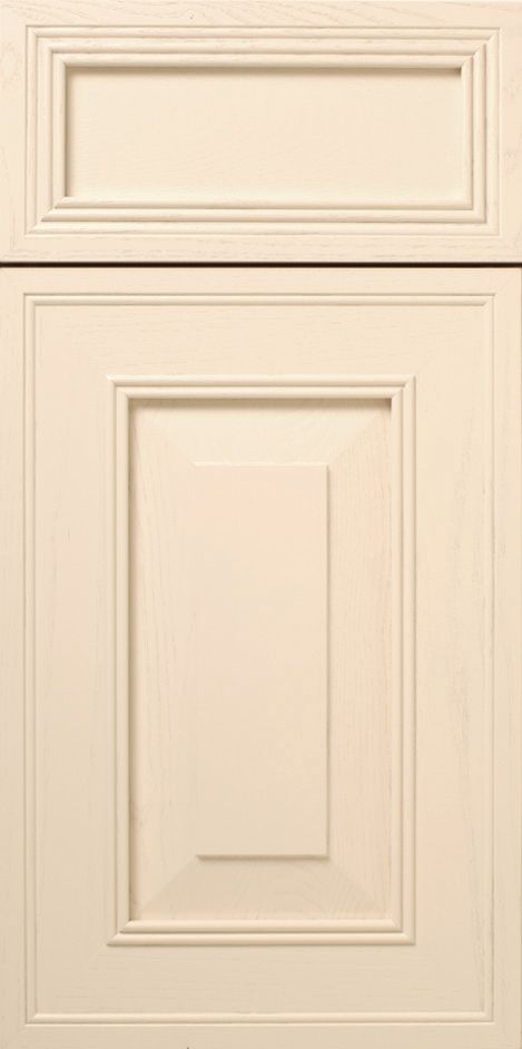 Off-white cabinet doors with recessed panels and decorative molding.