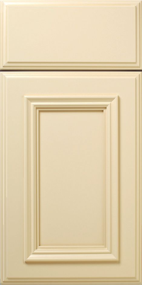 Cream-colored kitchen cabinet door with recessed panel and detailed trim.