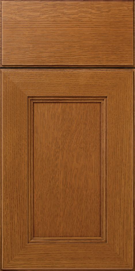 Wooden kitchen cabinet door in a medium brown stain with a raised panel.