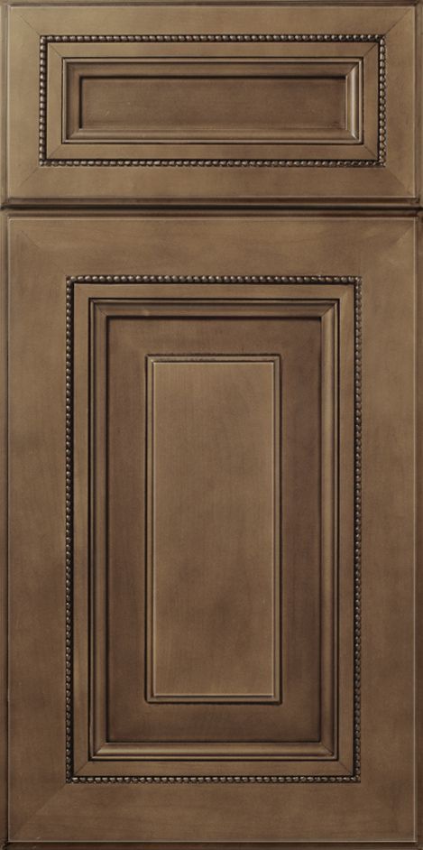 Brown wooden cabinet door with raised panels and beaded trim.