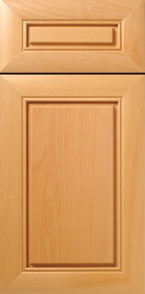 Light wood cabinet door with raised panel and recessed top panel.