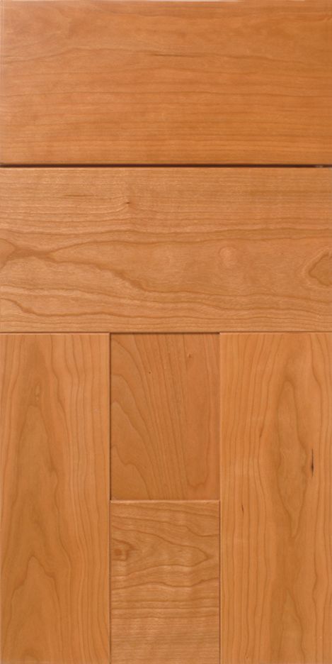 Wooden cabinet door with panels, featuring a warm, reddish-brown hue and visible wood grain.