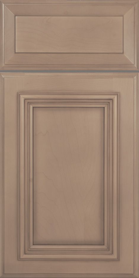 Tan-colored raised panel kitchen cabinet door with rectangular frame and recessed upper panel.