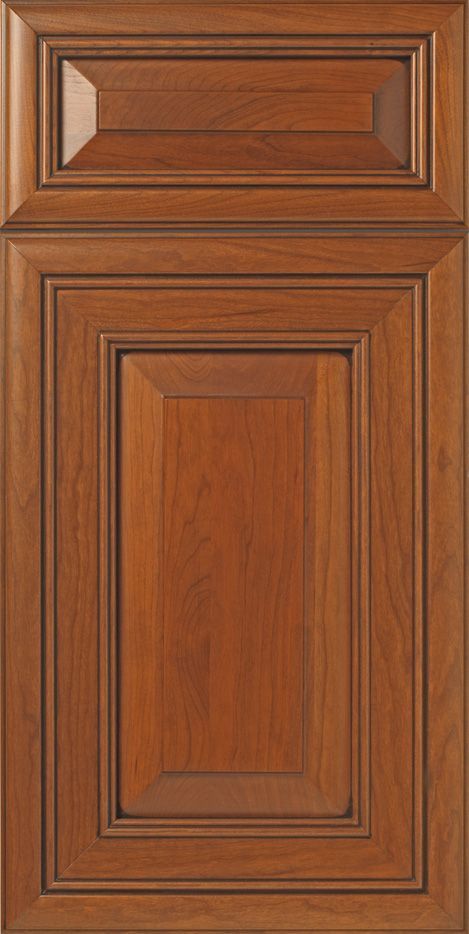 Wooden kitchen cabinet door. Brown with a raised panel design.