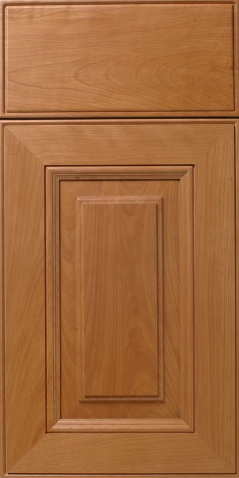 Wooden kitchen cabinet door, light brown with a raised panel design.