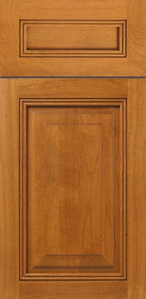 Close-up of a wooden cabinet door with a raised panel design, showing a light brown color.