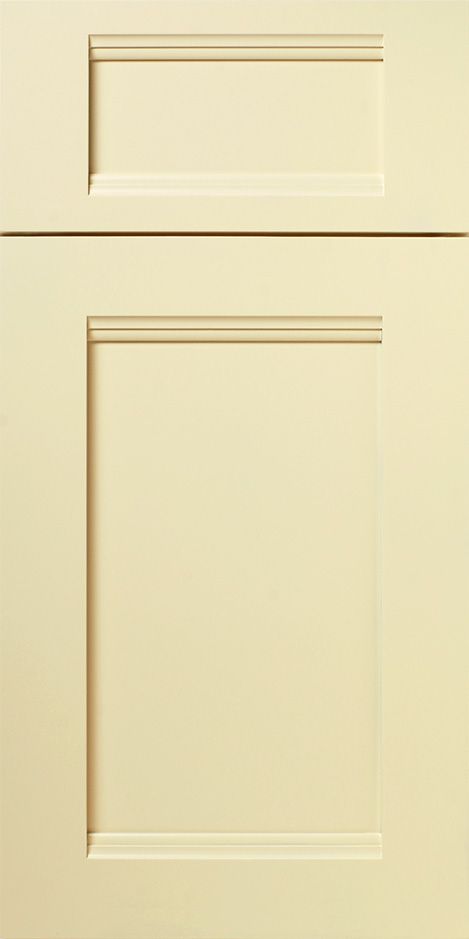 Close-up of a cream-colored cabinet door with a raised panel design.