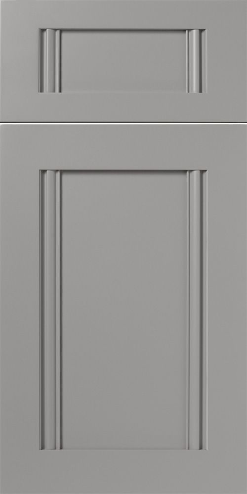 Gray cabinet door with recessed panel and decorative vertical grooves.