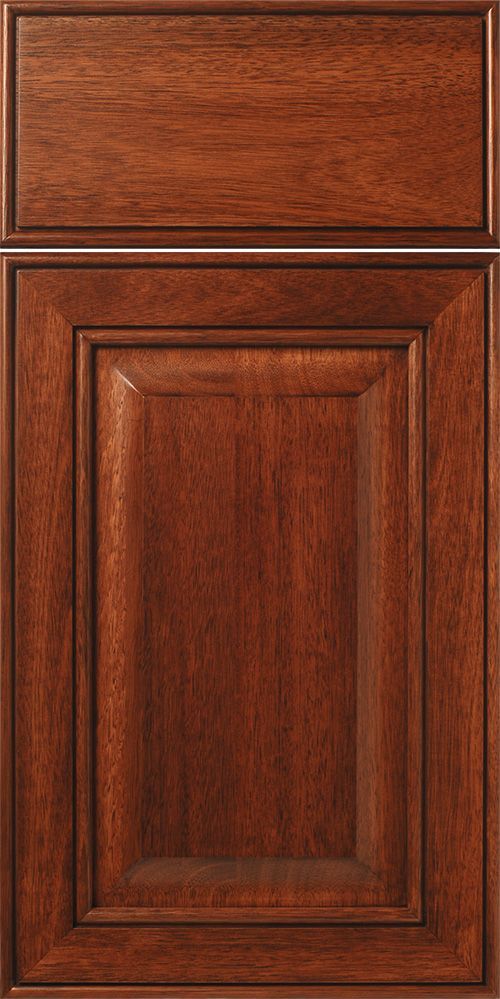 Brown wooden cabinet door with raised panel and frame.