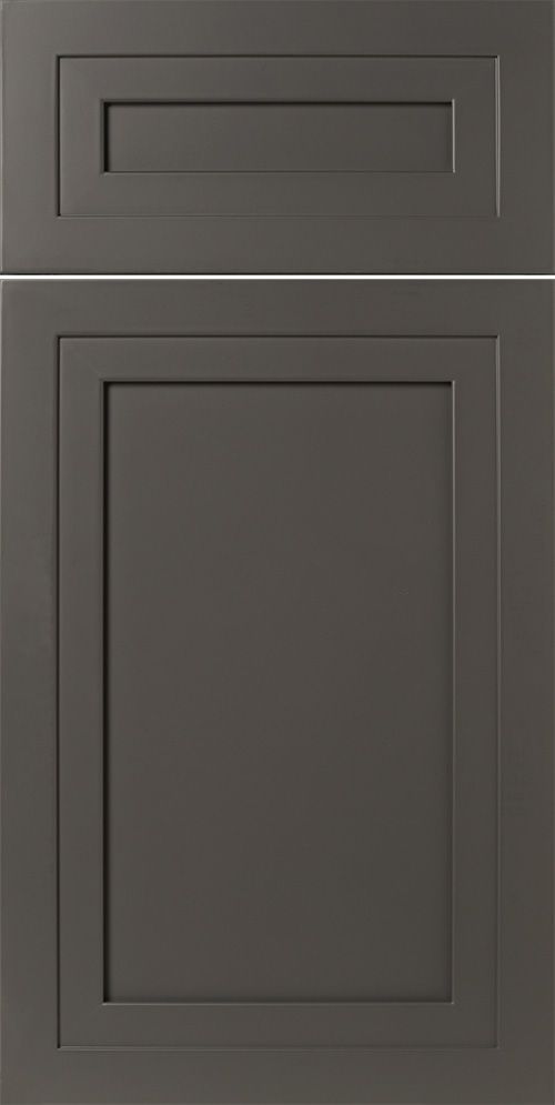 Gray kitchen cabinet door with recessed panel design.