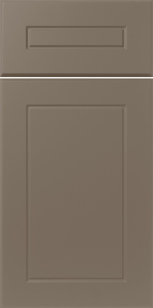 Two-toned cabinet door in muted brown. Upper door has a rectangular indented design.