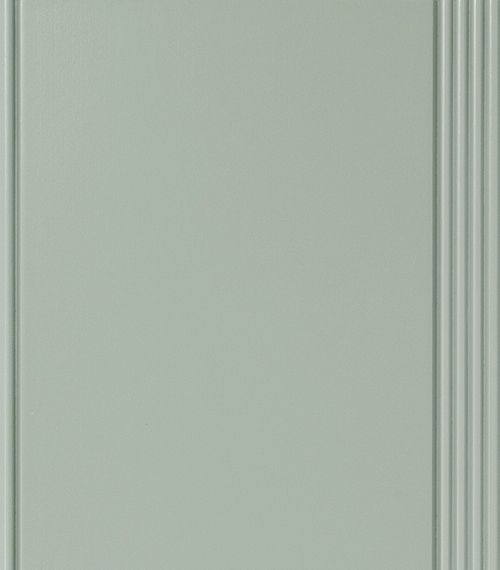 Light green cabinet door with vertical ridged detail on the right side.