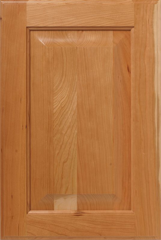 Wooden cabinet door with a raised panel, light brown color.
