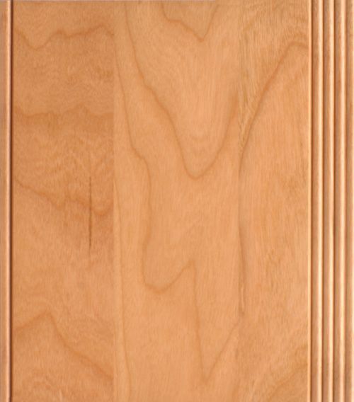 Light-colored wooden cabinet door with vertical wood grain and a fluted edge.