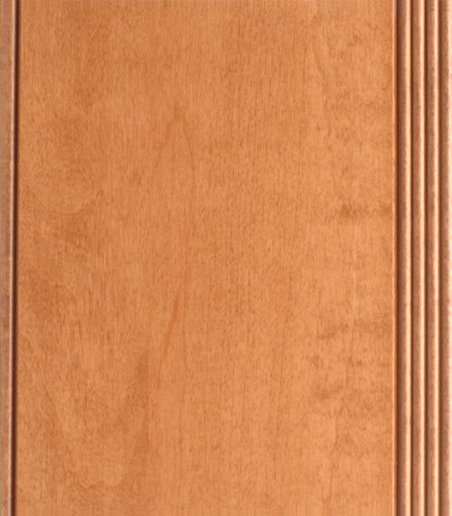 Wooden cabinet door with warm honey stain, vertical wood grain, and routed edge detail.
