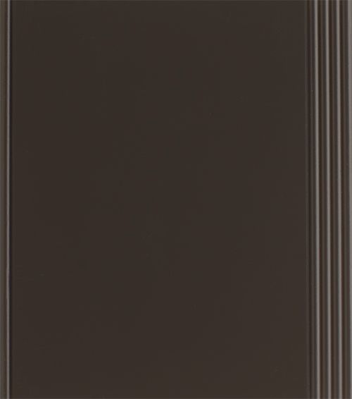Dark brown rectangular panel with vertical grooves on the right edge.