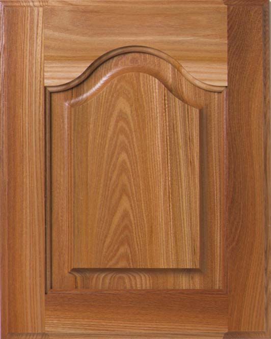 Wooden cabinet door with raised panel, light brown color, wood grain visible.
