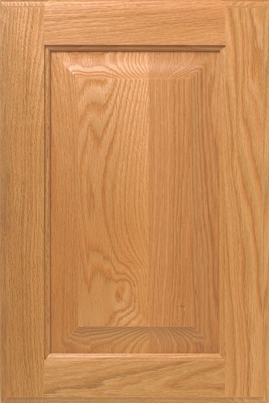 Wooden cabinet door with a raised panel and natural wood grain.